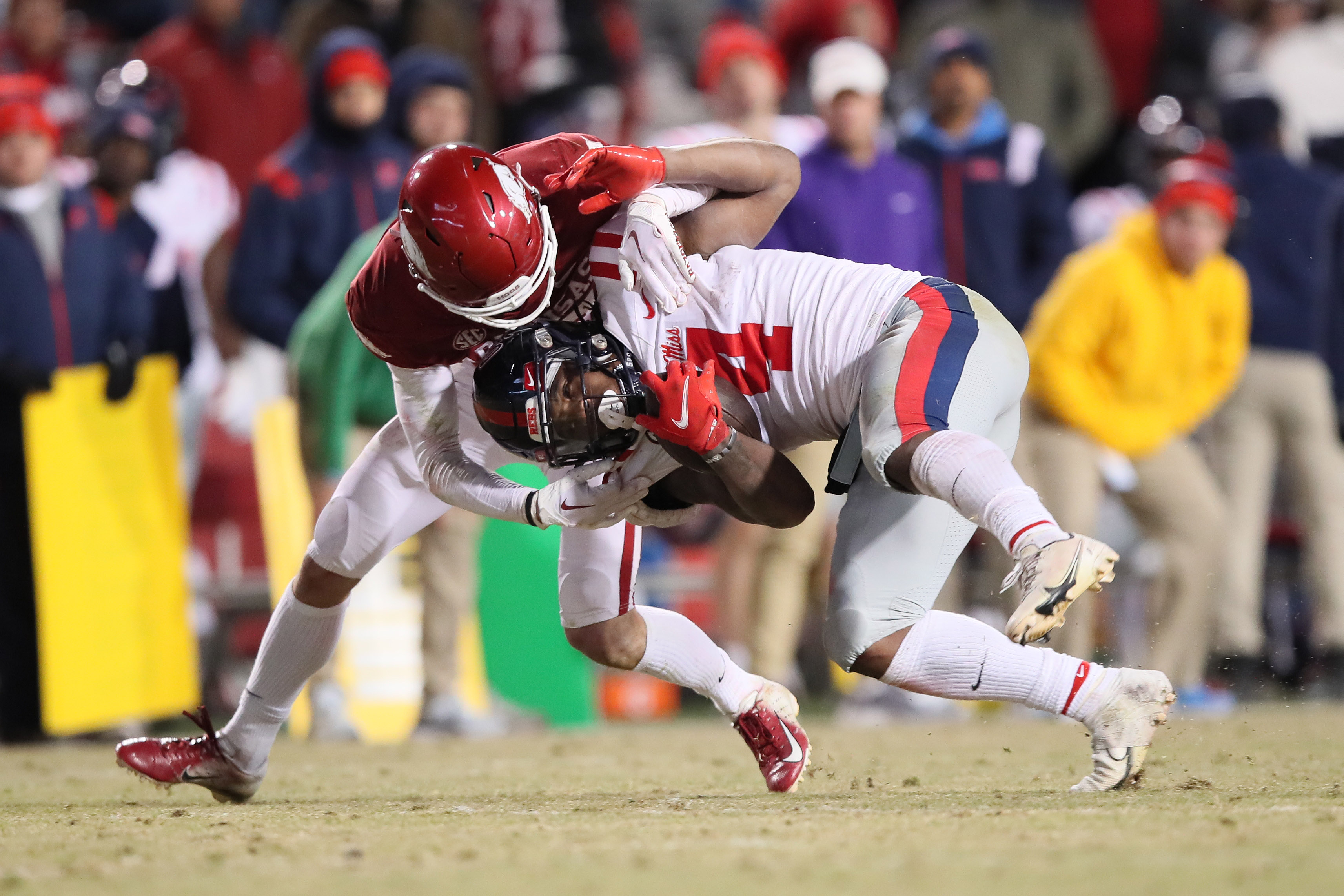 Arkansas safety Hudson Clark tackles Ole Miss running back Quinshon Judkins during their 2022 meeting.